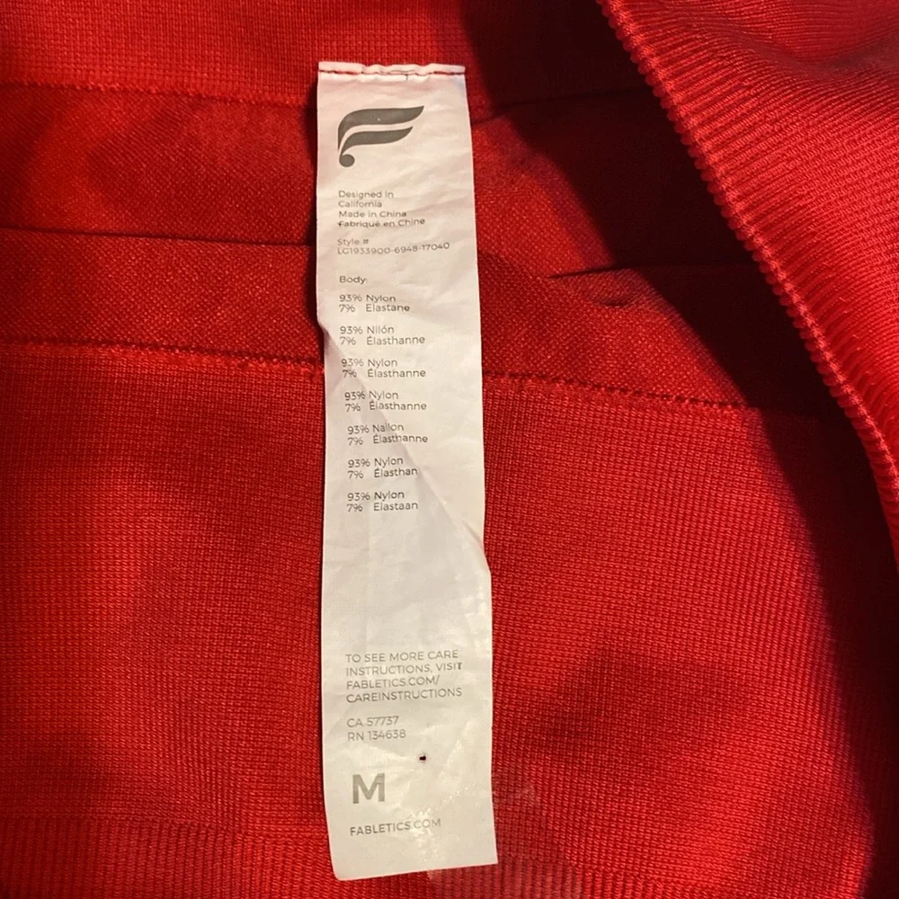 NWOT Fabletics Vibrant Red Women’s cropped Leggings. Air vents on legs. - Picture 5 of 6